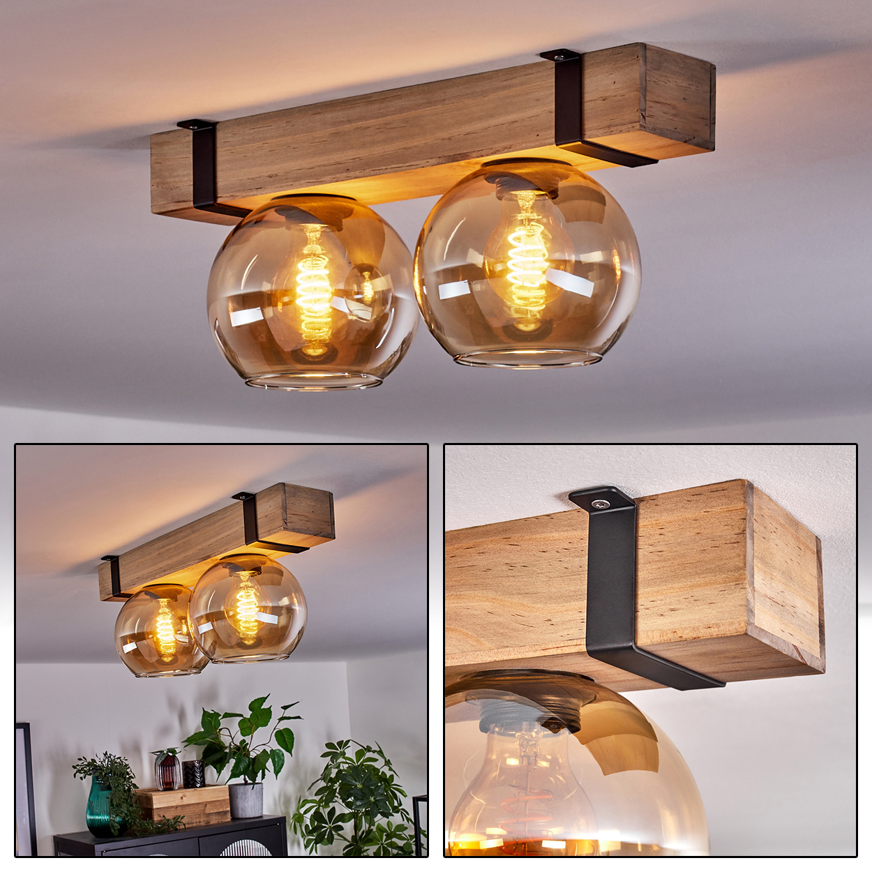 Eine Deckenlampe aus Holzbalken mit zwei bernsteinfarbenen Glaskugeln. Jede Kugel beherbergt eine warme Glühbirne. Die Lampe wird mit schwarzen Metallbügeln an der Decke befestigt.
