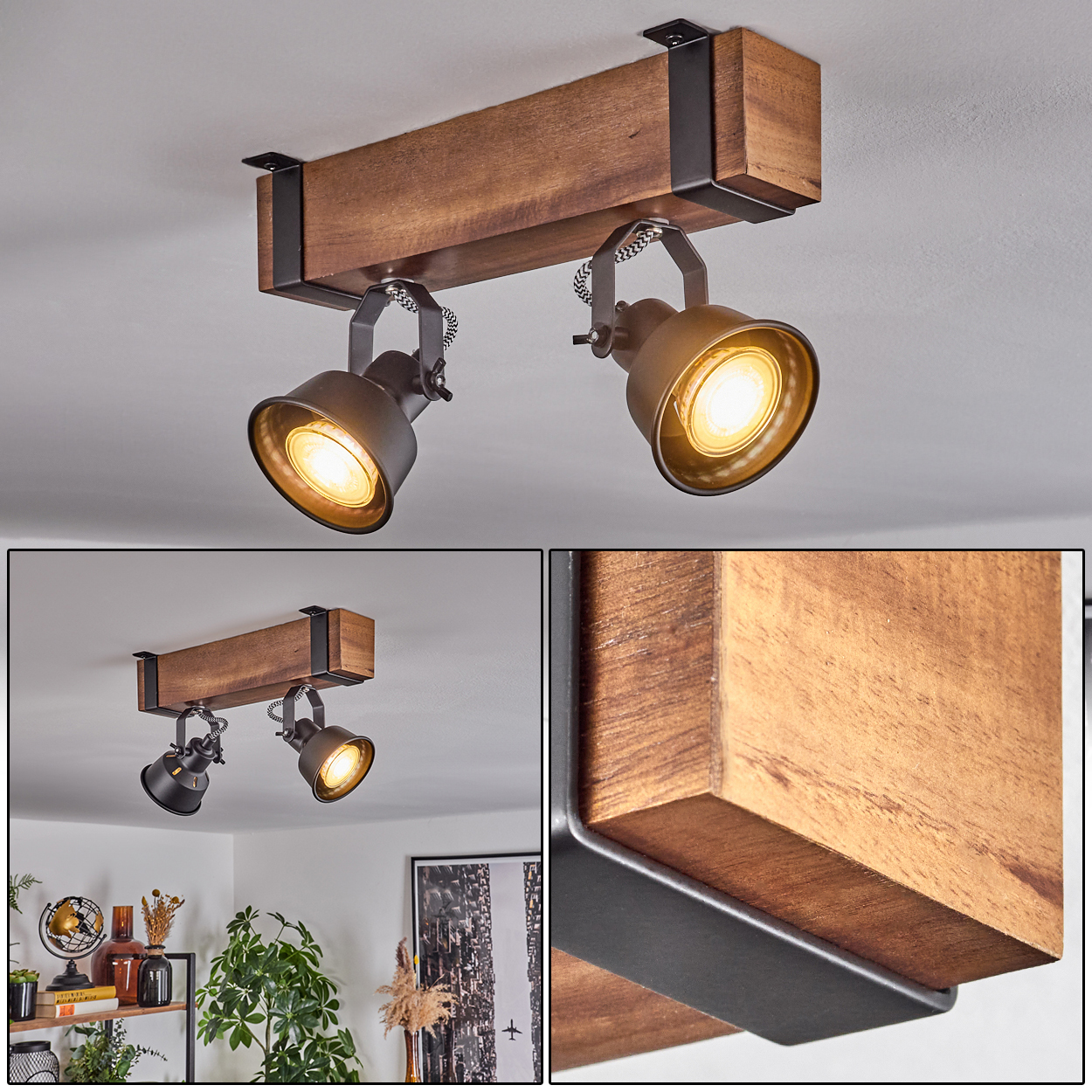 Eine Deckenlampe aus Holzbalken mit zwei verstellbaren Strahlern. Die Strahler sind schwarz und der Balken ist braun. Das Licht ist an.