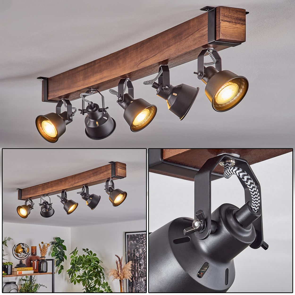 Ein Holzbalken mit fünf schwarzen Strahlern. Jeder Strahler hat ein hellgelbes Licht. Der Hintergrund ist eine weiße Decke.