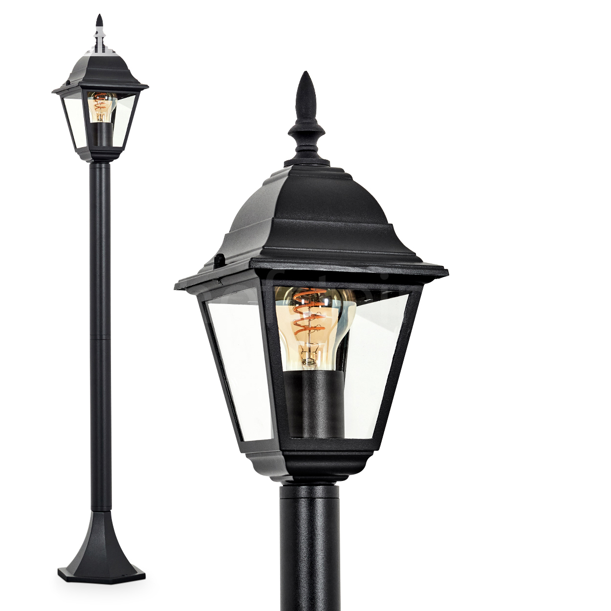 Schwarze Außenlampe mit Glasgehäuse, sichtbarer Glühbirne und dekorativer Spitze. Sie steht auf einer schwarzen Stange vor weißem Hintergrund.
