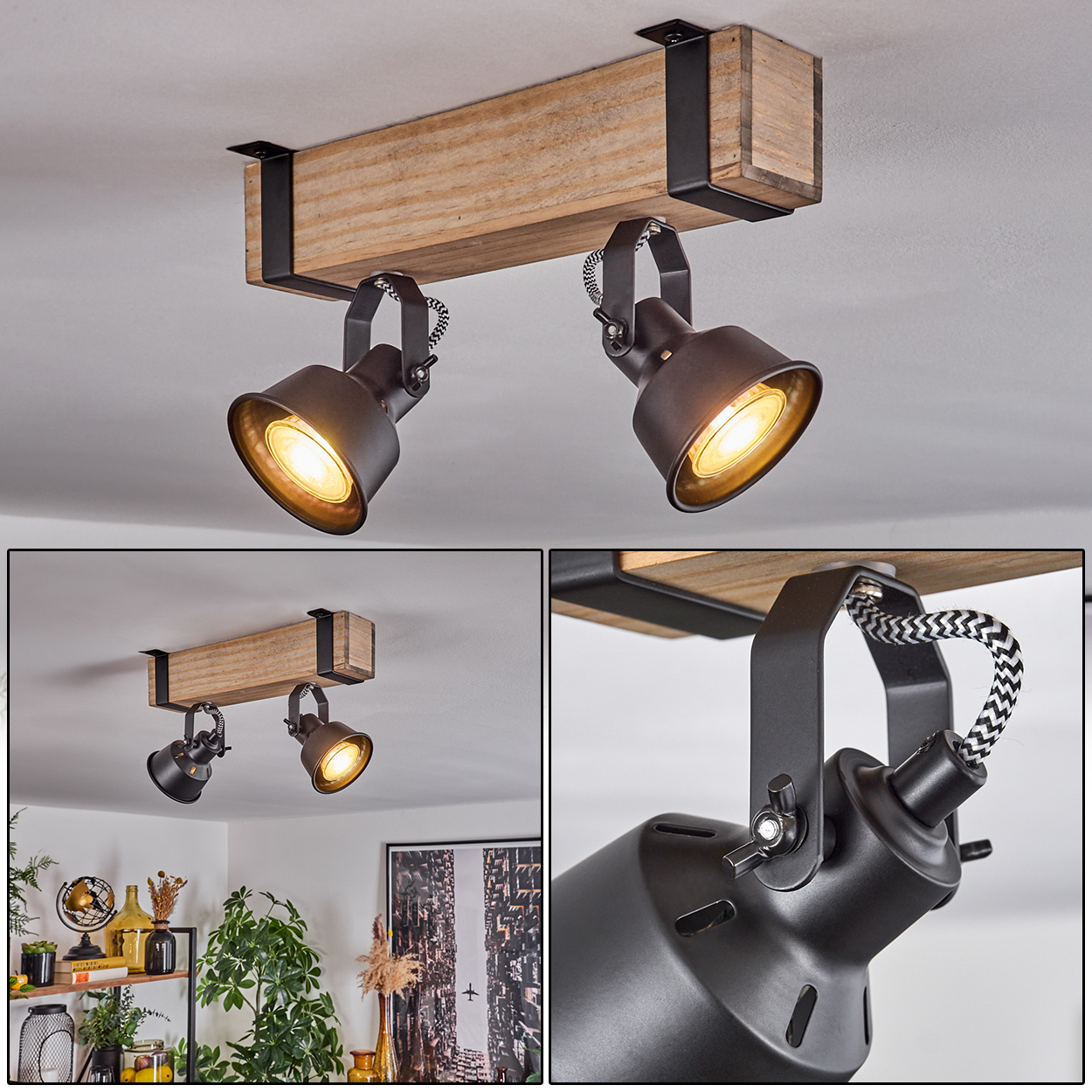Deckenleuchte mit zwei Strahlern. Die Leuchte ist an einem Holzbalken mit schwarzen Metallakzenten befestigt, und die Strahler sind schwarz.
