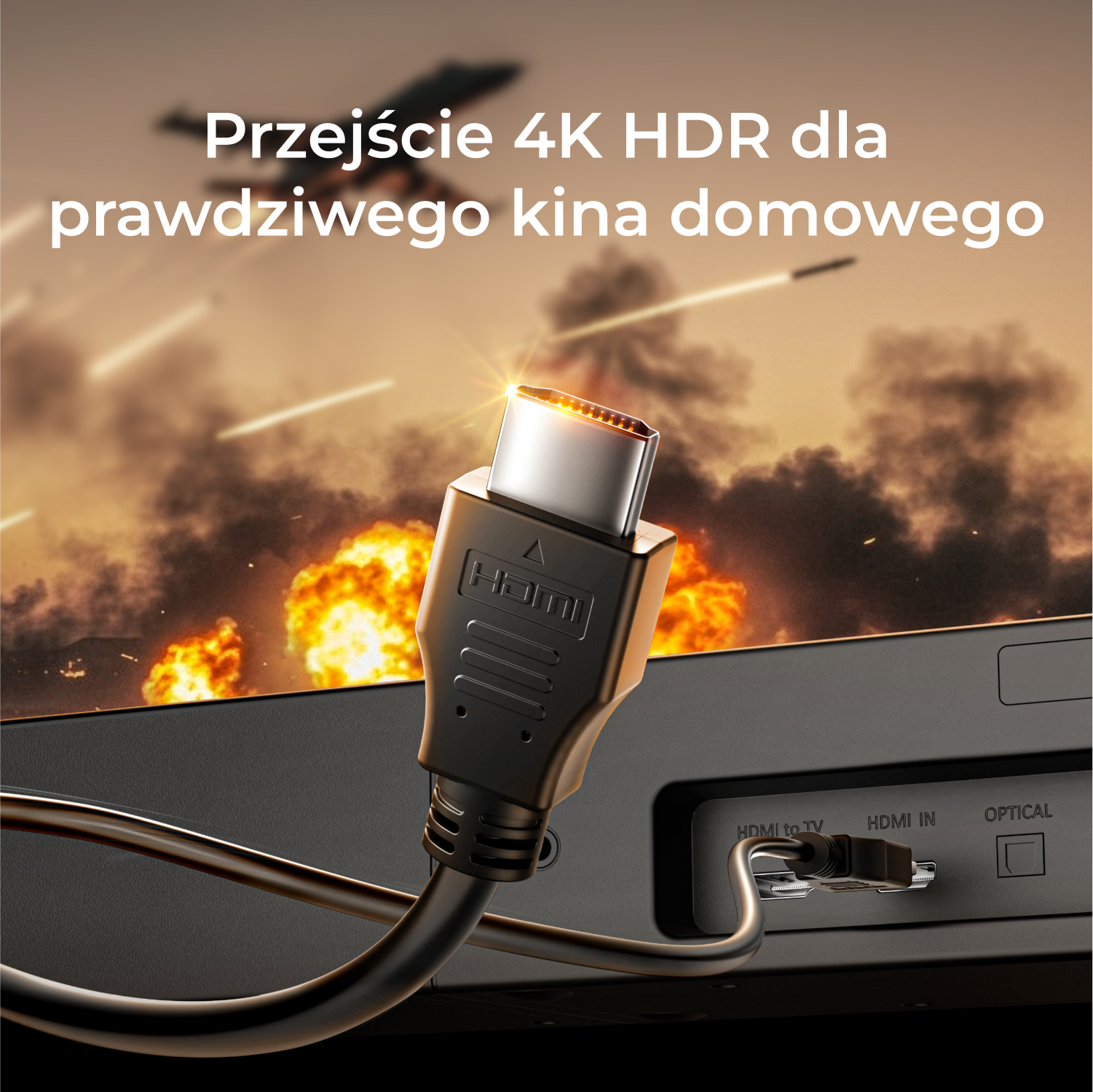Czarny kabel HDMI podłączony do telewizora. Tło przedstawia eksplozje i tekst w języku polskim.