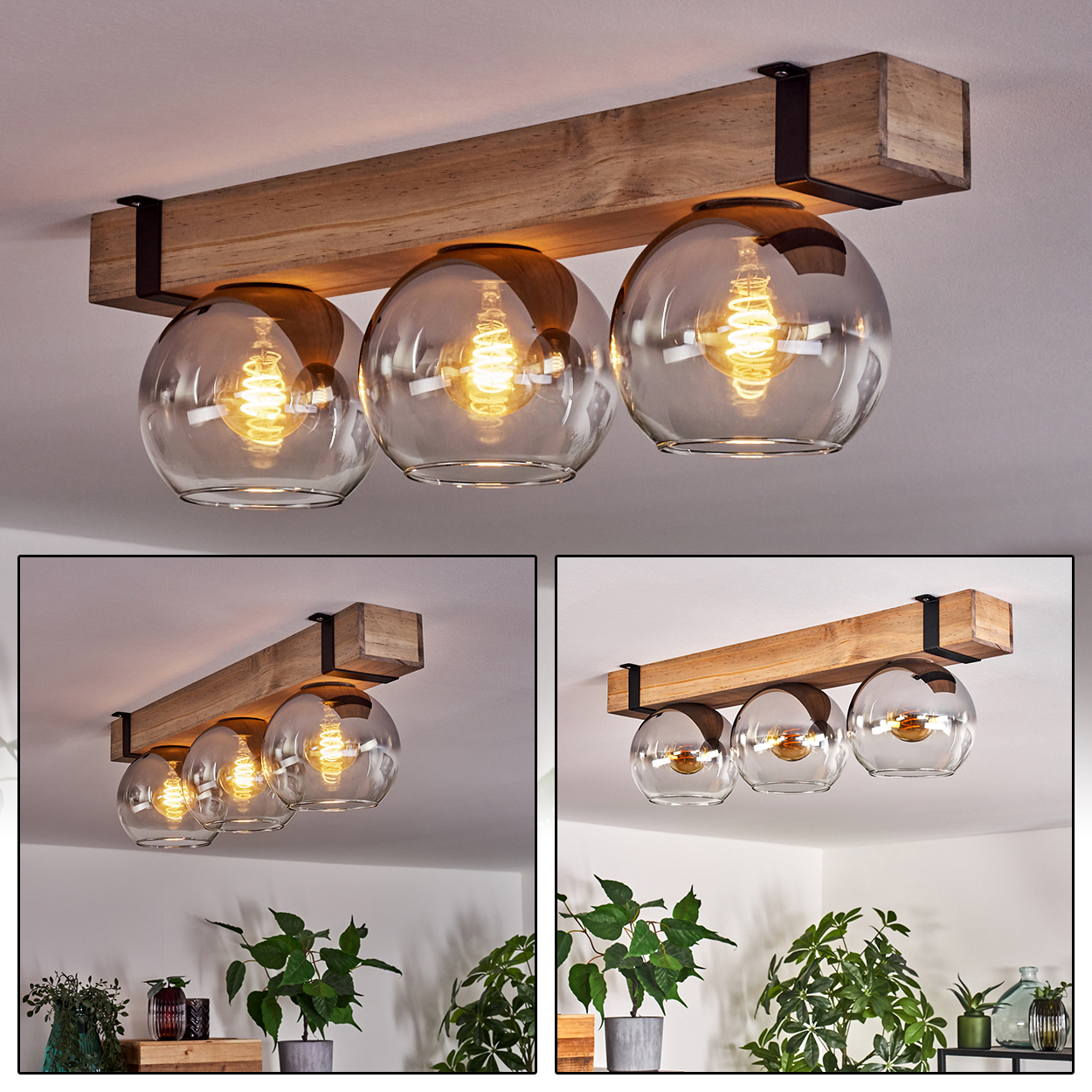 Deckenleuchte aus Holzbalken mit drei Glaskugel-Schirmen, jeweils mit sichtbarer Glühbirne. Schwarze Metallhalterungen sichern sie.