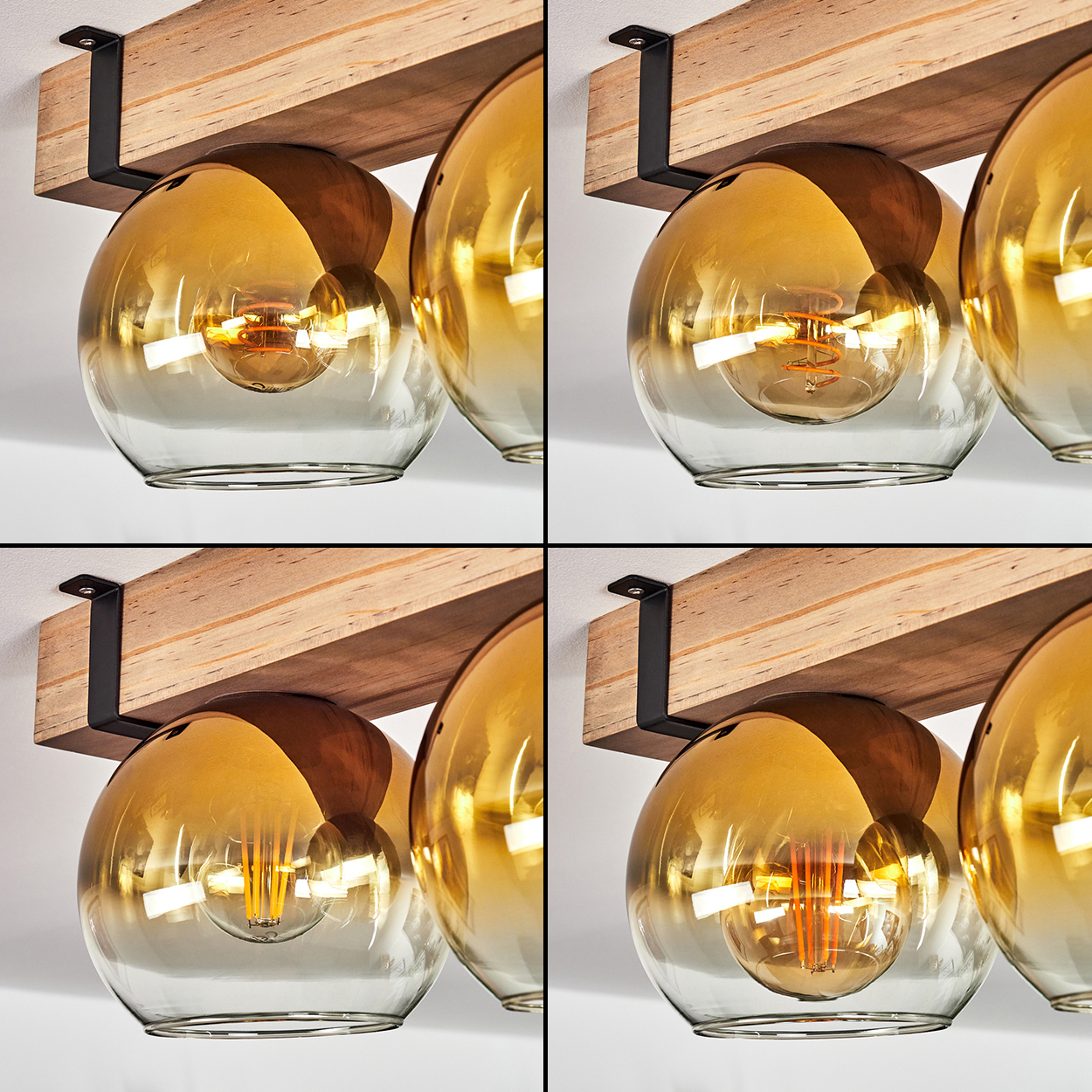 Vier Lampen mit Glaskugeln und Edison-Glühbirnen sind an einem Holzbalken befestigt. Die Lampen sind an einer weißen Decke montiert.