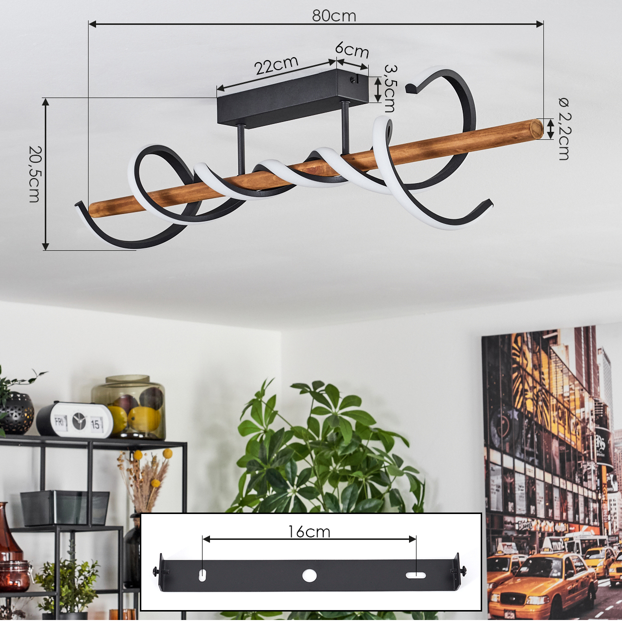 Eine moderne Deckenlampe mit schwarz-weißen Wirbellichtern und einem Holzbalken. Der Hintergrund zeigt einen Raum mit Pflanzen und einem New York City Bild.