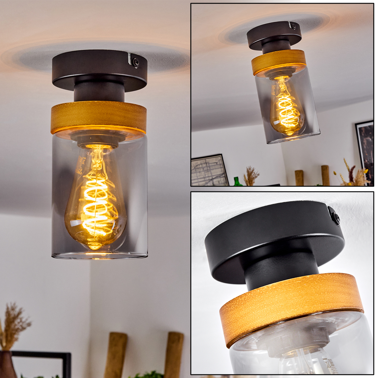 Eine moderne Deckenleuchte. Sie hat einen schwarzen Sockel, Holzakzente und einen klaren Glaszylinder, der eine leuchtende Edison-Glühbirne umschließt.