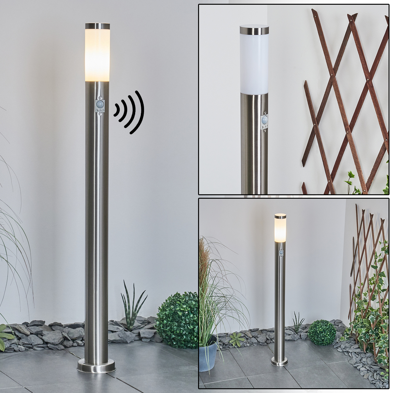 Eine Außenlampe aus Edelstahl mit Bewegungsmelder. Sie ist zylindrisch mit einem Licht oben. Pflanzen und Steine befinden sich im Hintergrund.