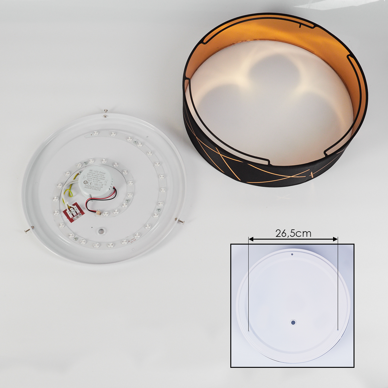 Deckenlampenteile: weiße Basis mit LEDs, schwarzer Schirm mit goldener Innenseite und ein Diagramm mit 26,5 cm.