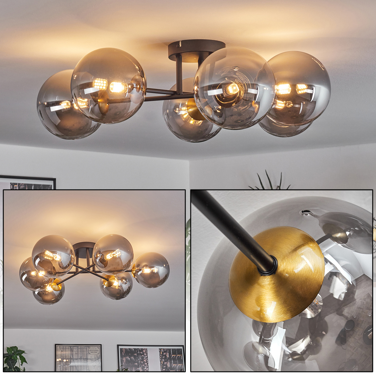 Eine moderne Deckenleuchte mit sechs kugelförmigen Glasschirmen. Die Metallarme sind schwarz mit goldenen Akzenten. Der Hintergrund ist eine weiße Decke.