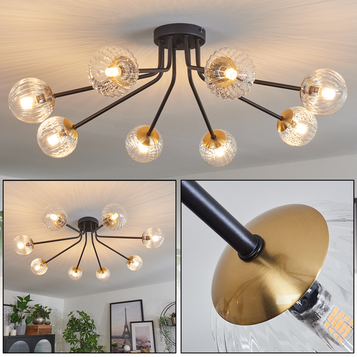 Eine moderne Deckenleuchte mit Glaskugeln und schwarzen Armen. Das Licht hat einen goldenen Akzent und ist eingeschaltet.
