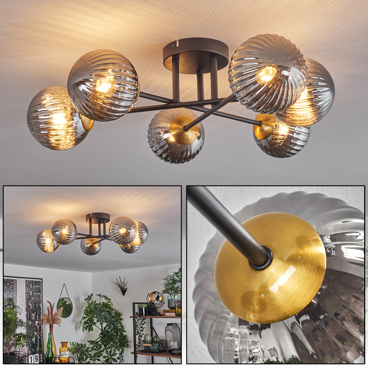 Deckenleuchte mit sechs rauchigen Glaskugeln. Das Licht ist braun und gold, mit einer grauen Decke. Der Raum hat Pflanzen.