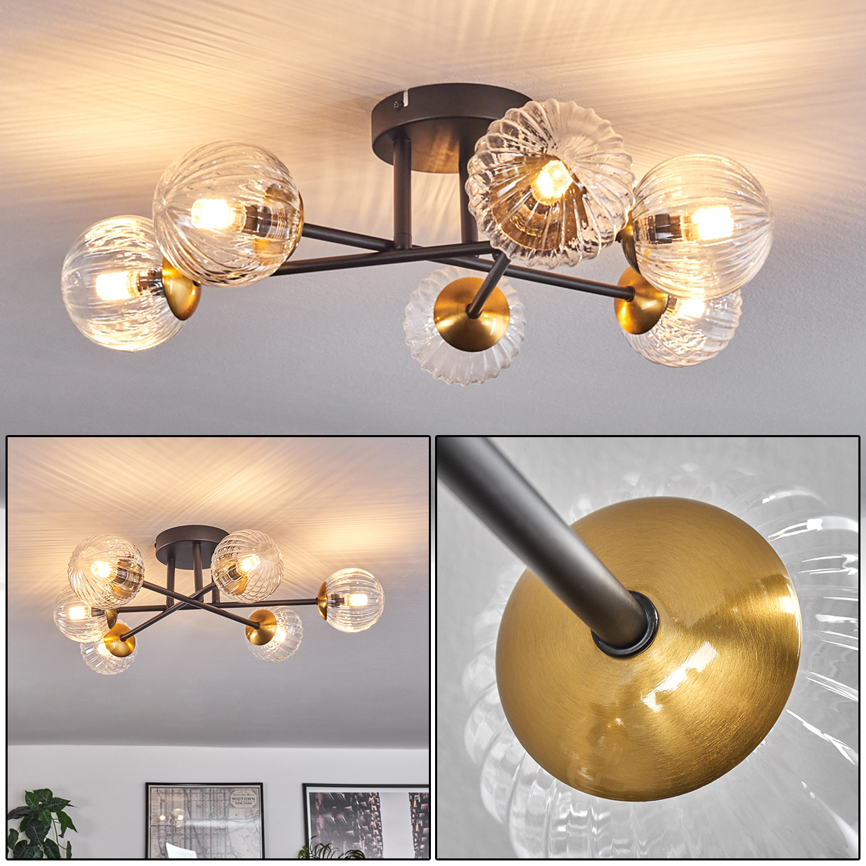 Eine moderne Deckenleuchte mit sechs Glaskugeln, schwarzen Armen und goldenen Akzenten. Der Hintergrund zeigt eine weiße Decke.
