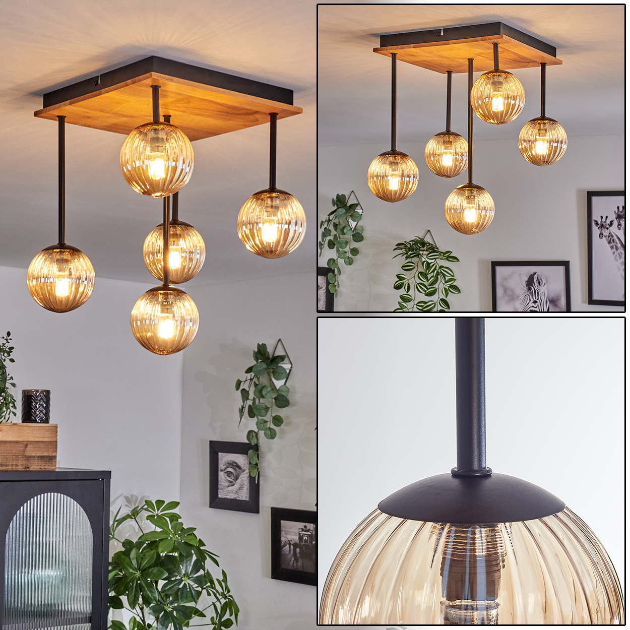 Eine Hängelampe mit bernsteinfarbenen Glaskugeln hängt an einer Holz- und schwarzen Metallkonstruktion. Der Hintergrund umfasst Pflanzen und gerahmte Bilder.