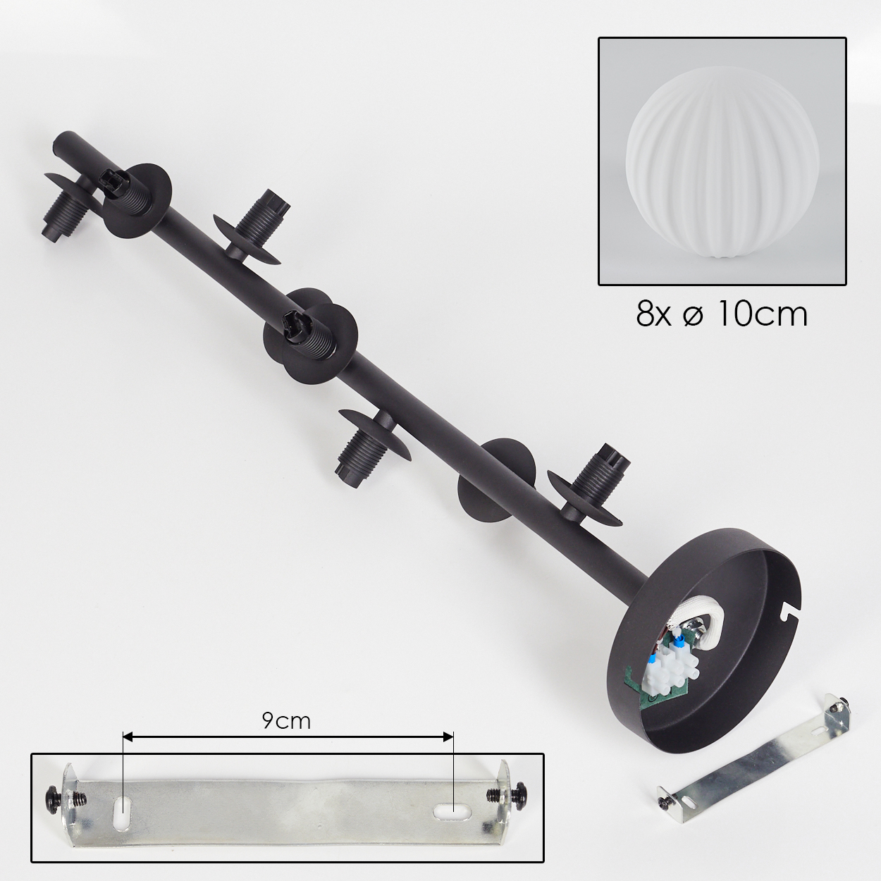 Schwarze Kronleuchterkomponenten auf weißem Hintergrund. Enthält eine runde Leuchte, eine Metallhalterung und ein 9 cm Maß.
