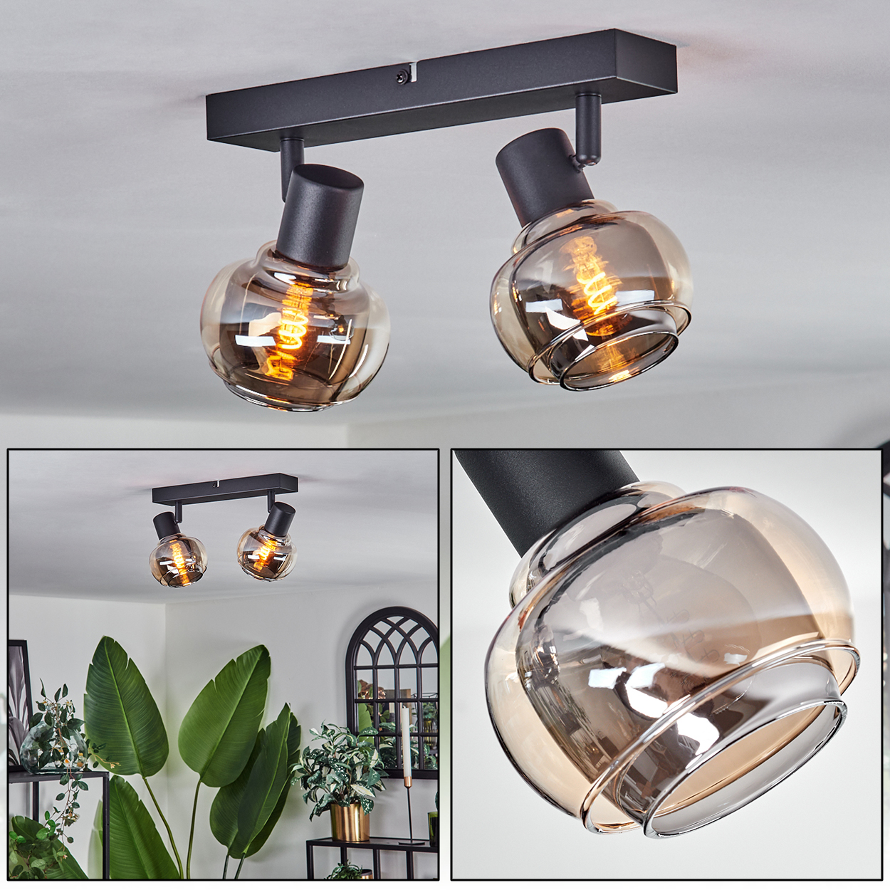 Ein schwarzer Deckenstrahler mit zwei Lampen aus bernsteinfarbenem Glas. Die Lichter sind an, der Hintergrund ist weiß.