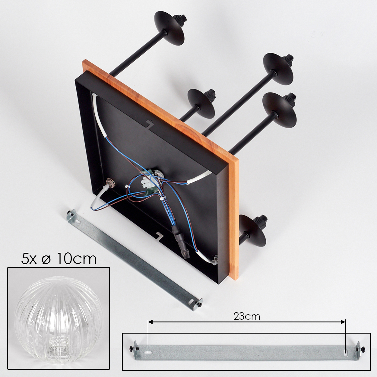 Draufsicht auf eine schwarze und Holz-Lampenhalterung mit Metallstangen, einem klaren Glaskolben und einer Metallhalterung auf weißem Untergrund.