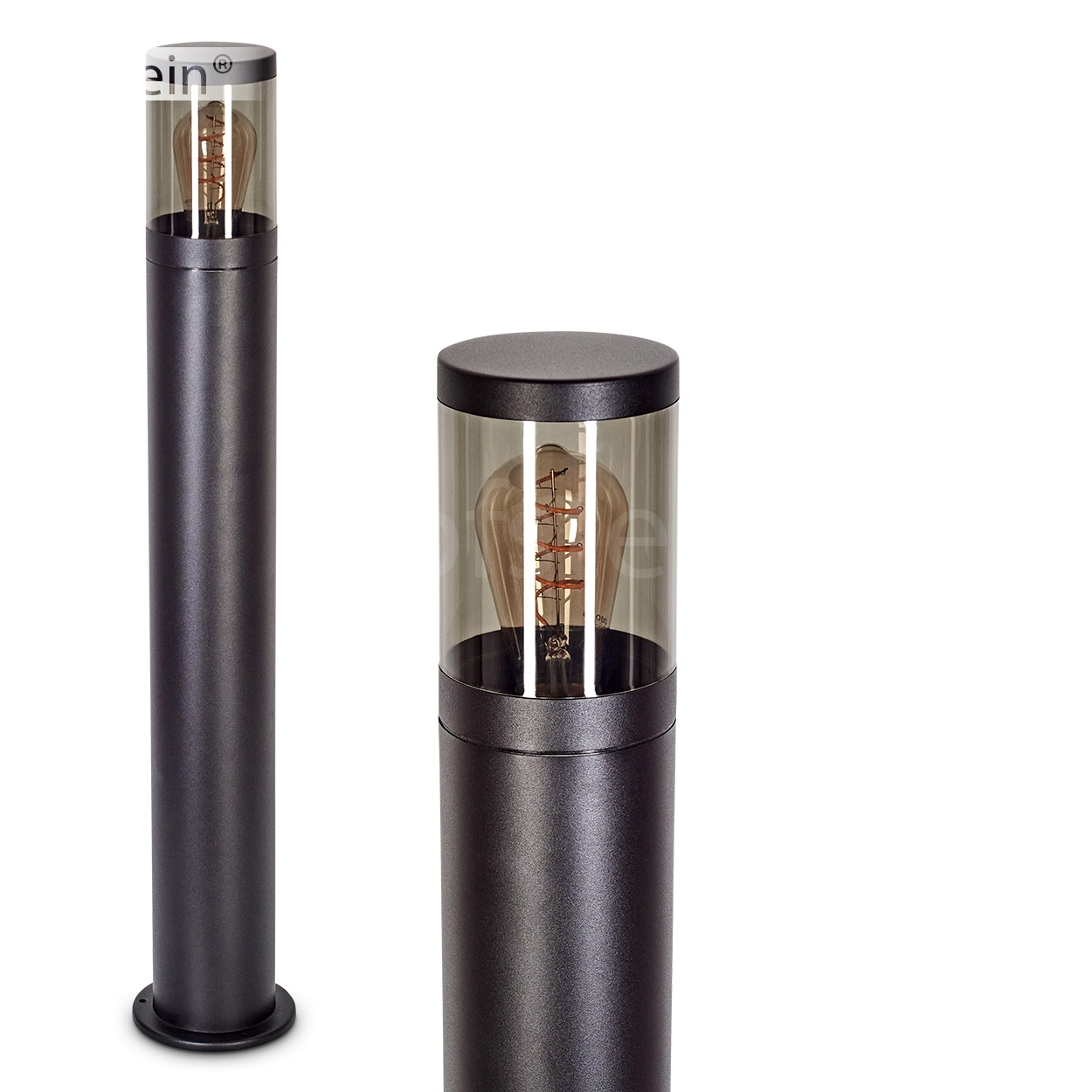 Zwei dunkelgraue zylindrische Außenlampen. Jede hat ein Glasgehäuse mit einer warmen Glühbirne. Weißer Hintergrund.