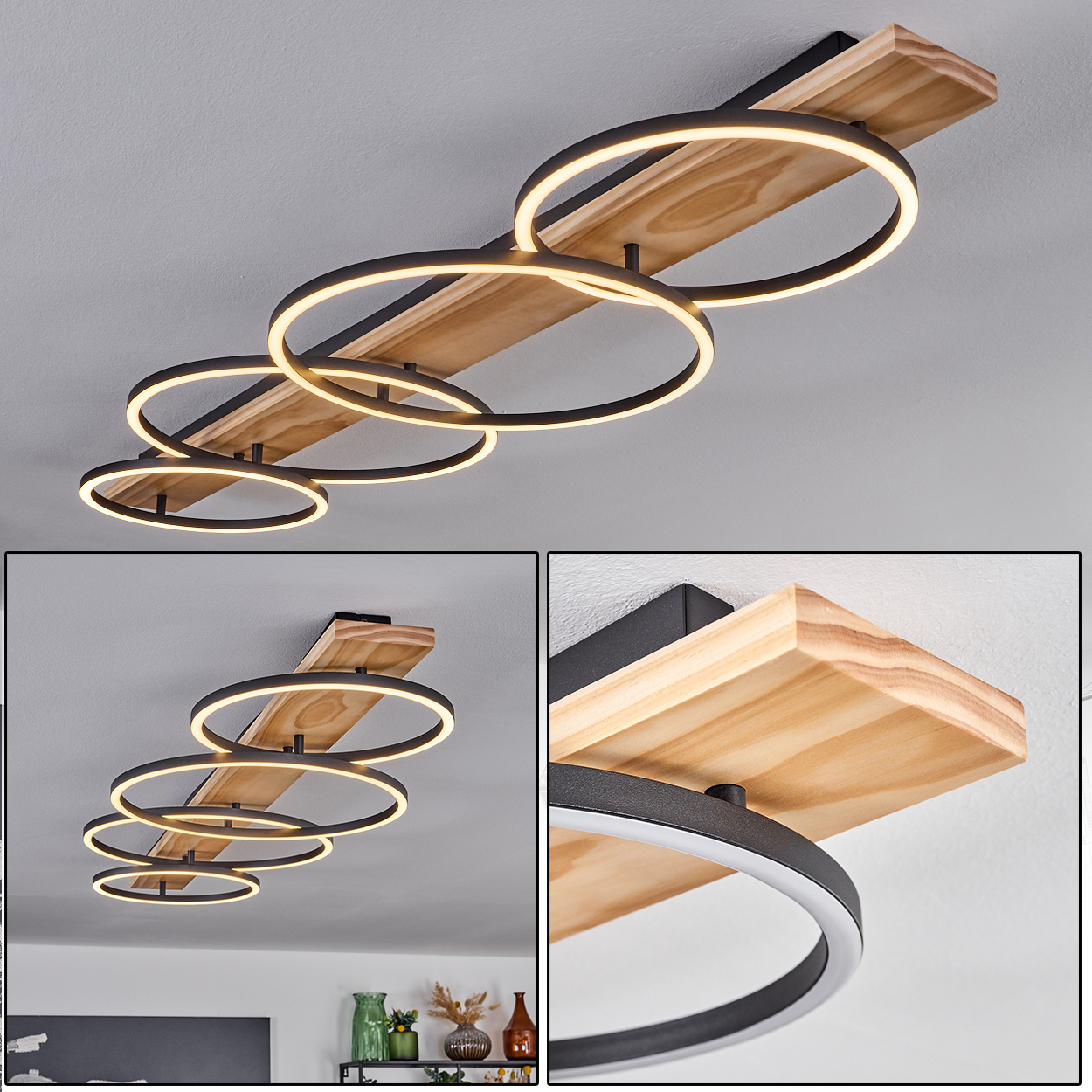 Moderne Deckenleuchte mit vier miteinander verbundenen kreisförmigen Lichtern, montiert auf einem Holzbalken.