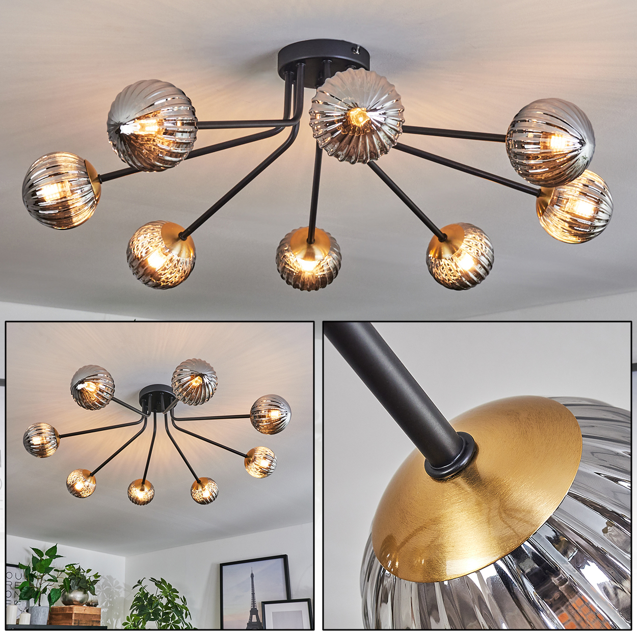 Eine moderne Deckenleuchte mit mehreren Glaskugel-Schirmen. Die Leuchte hat schwarze Arme und ein silbernes und goldenes Finish.
