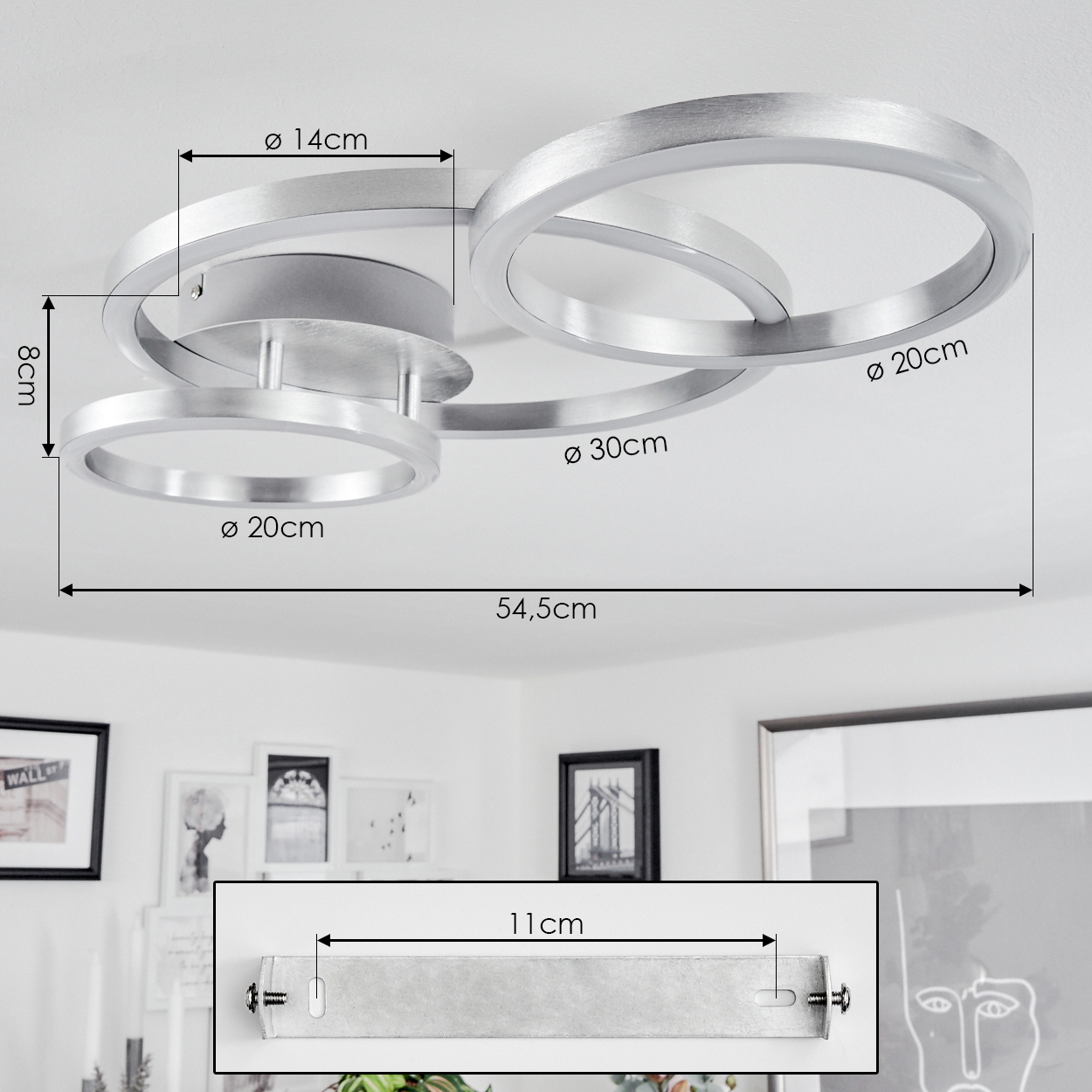 Silberne Deckenlampe mit drei kreisförmigen Lichtern. Abmessungen sind auf dem Bild markiert. Zusätzliche Detail zeigt eine Montagehalterung.