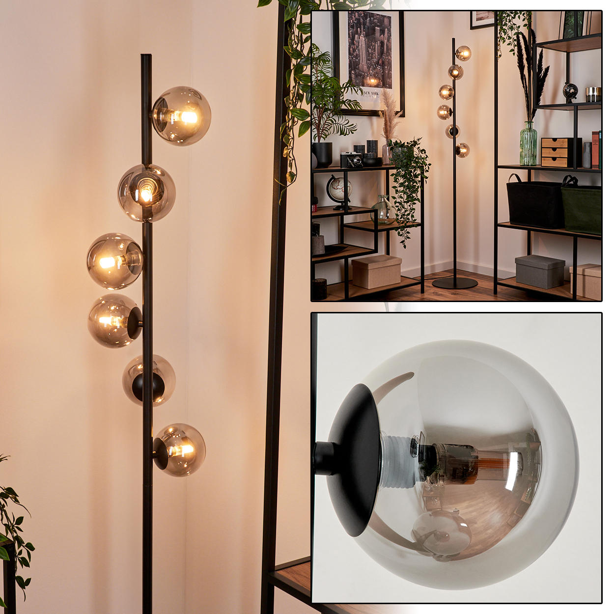 Eine schwarze Stehlampe mit fünf Glaskugeln. Der Hintergrund zeigt ein Bücherregal mit Dekoration, Pflanzen und einem gerahmten Bild.