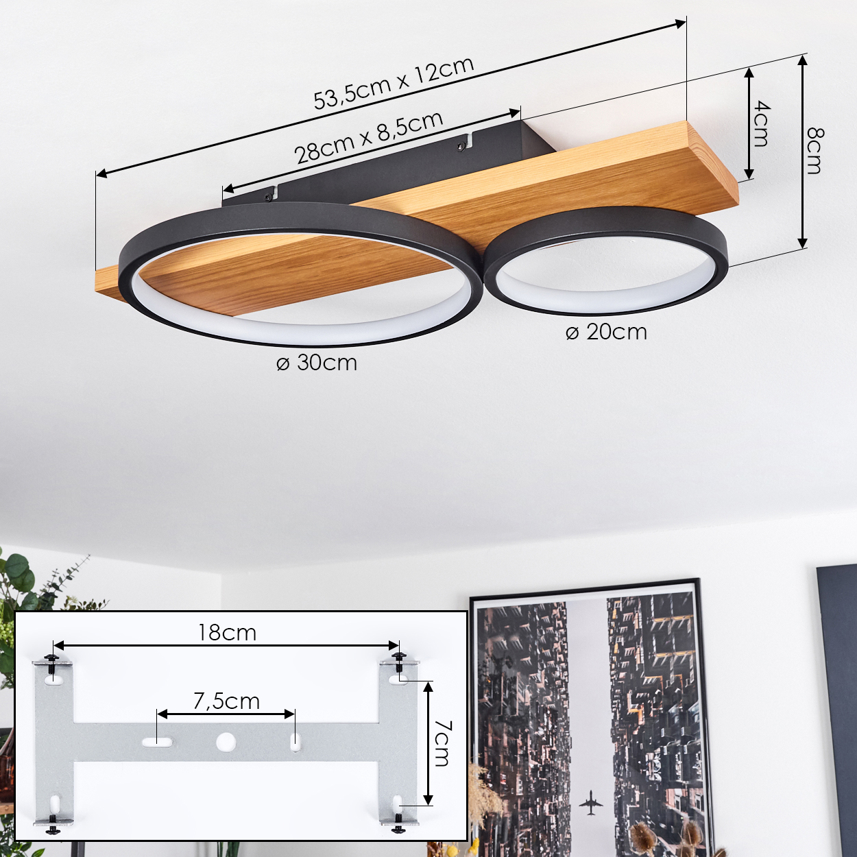 Eine Deckenleuchte mit zwei schwarzen kreisförmigen Lichtern. Die Leuchte hat Holz- und Metallelemente, mit Maßangaben.