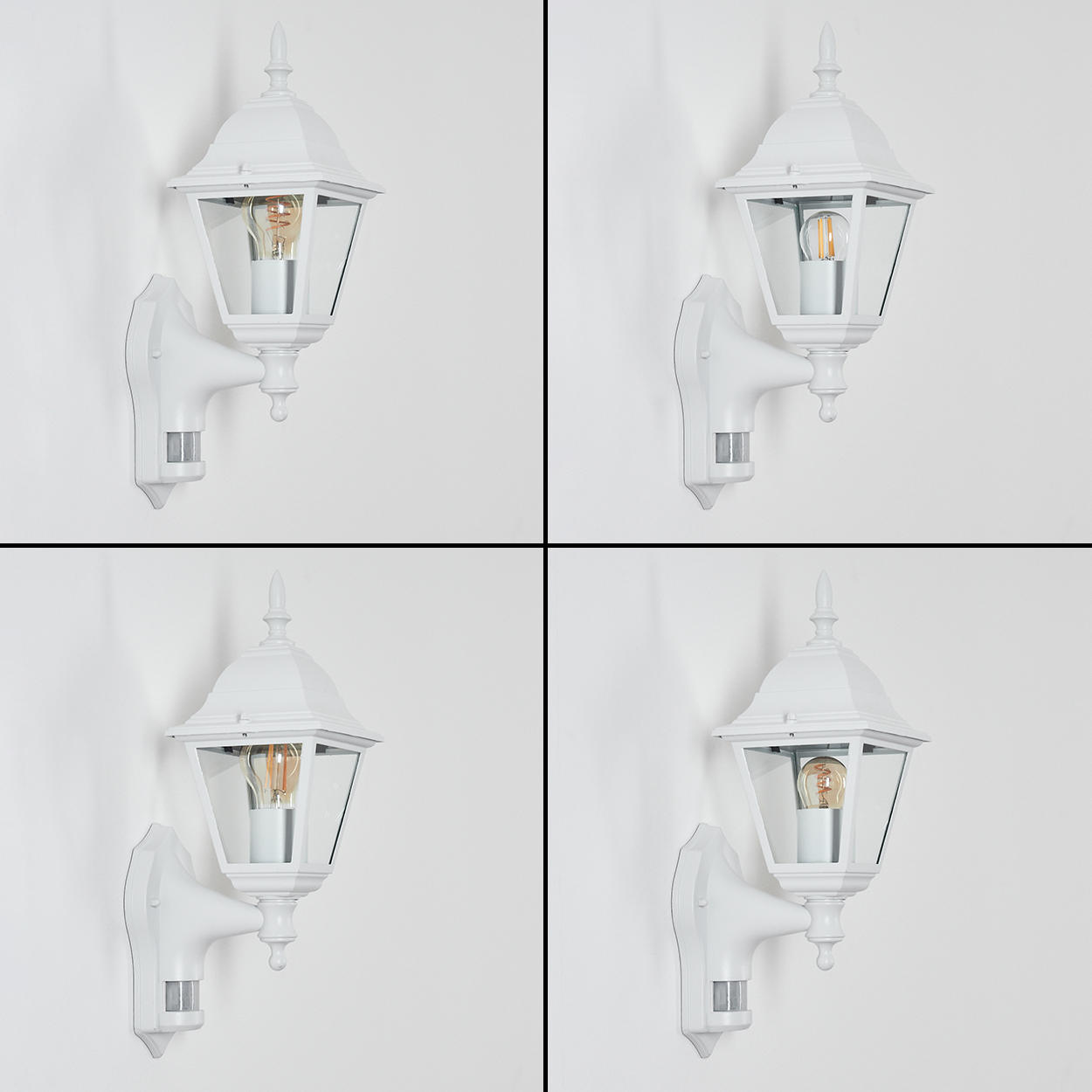 Vier weiße Außenlampen an einer weißen Wand. Jede Lampe hat eine Glühbirne.