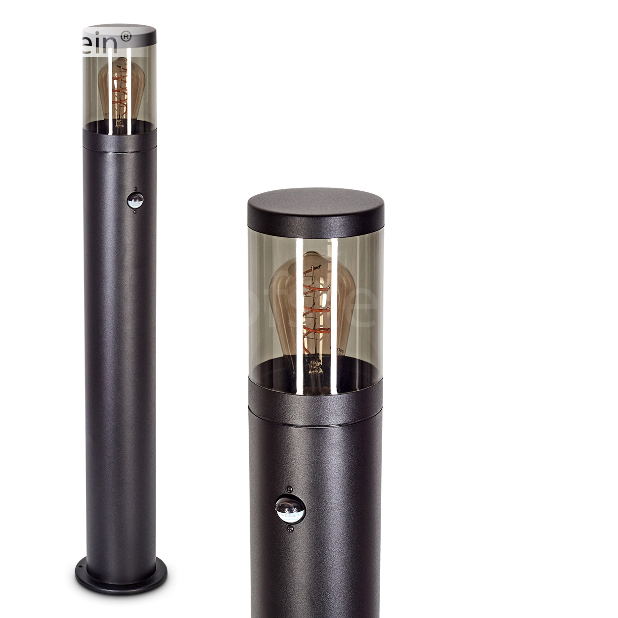 Zwei dunkelgraue zylindrische Außenlampen mit einer Glühbirne in einem transparenten Zylinder. Weißer Hintergrund.