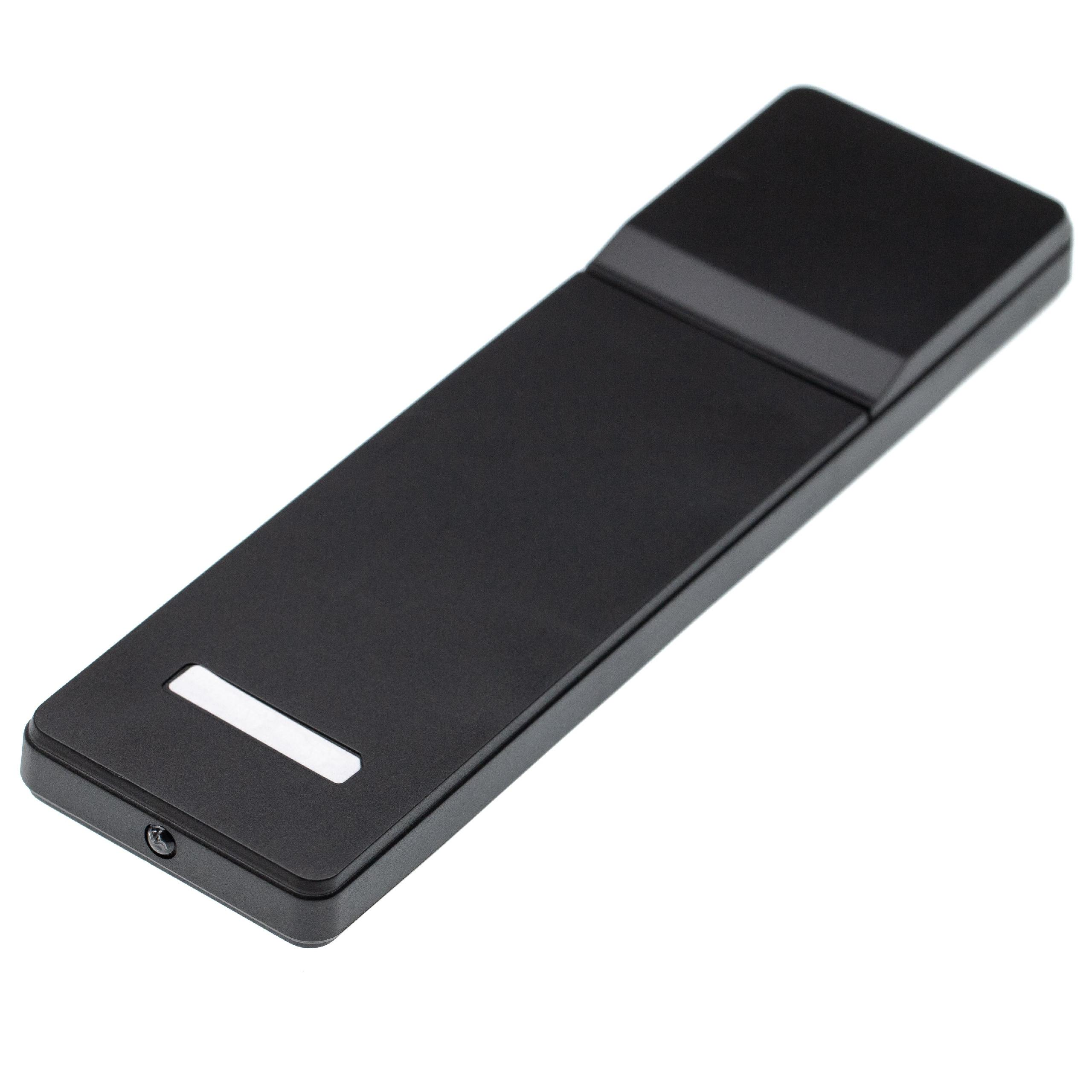 Ein schwarzes rechteckiges Gerät, möglicherweise ein USB-Stick, auf weißem Hintergrund. Es hat ein weißes Kontrolllicht und einen kleinen Anschluss.