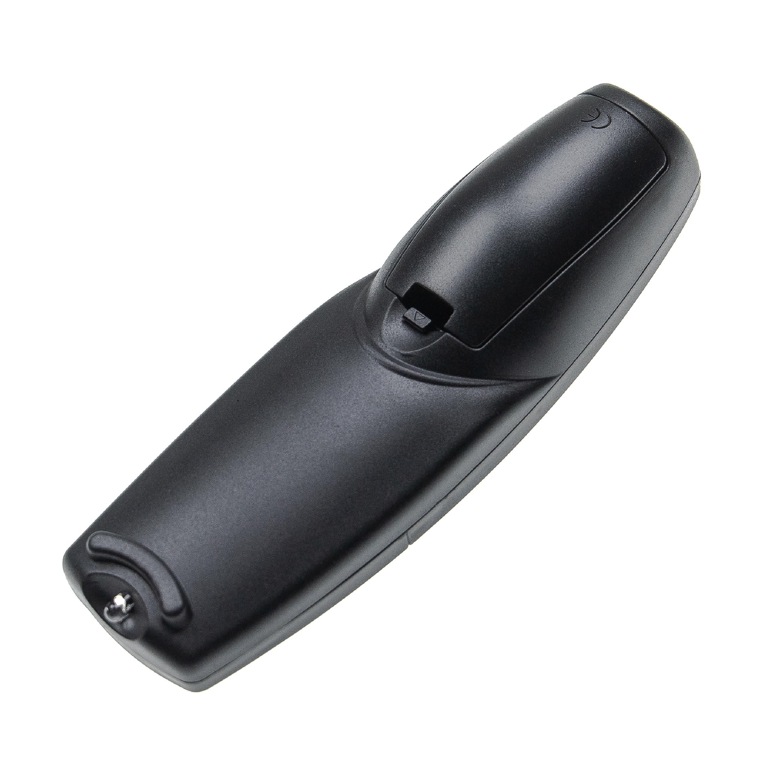 Eine schwarze Fernbedienung. Sie hat eine lange, gebogene Form mit einer Taste oben und einem kleinen Metallteil unten.