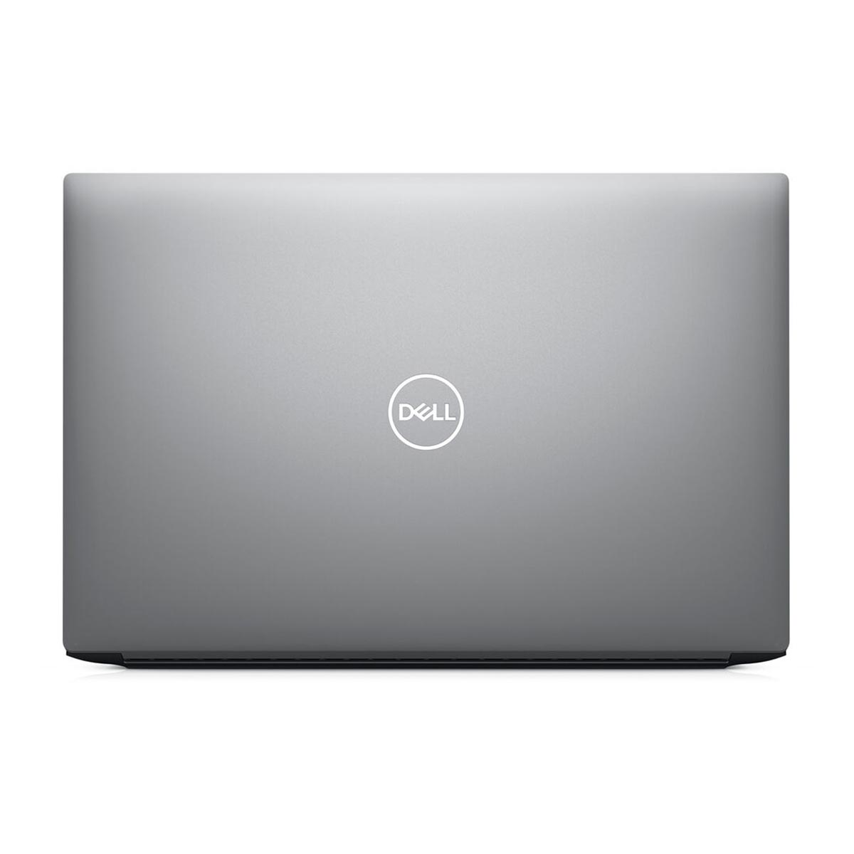 Zamknięty, szary laptop Dell. Logo Dell znajduje się na środku. Laptop jest na białej powierzchni.