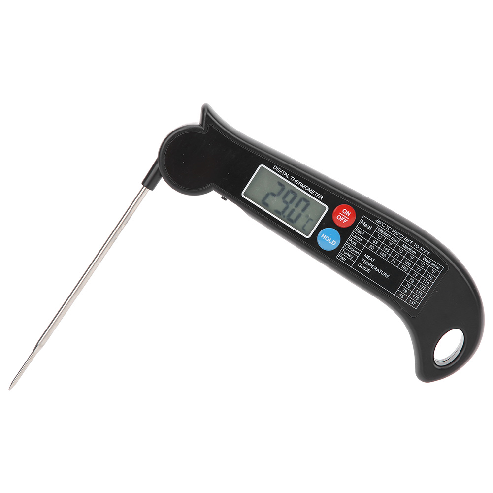 Ein schwarzes Digitalthermometer zeigt 29,0 an. Es hat eine Edelstahlsonde und einen Ein-/Ausschalter. Fleischtemperaturanzeige ist sichtbar.