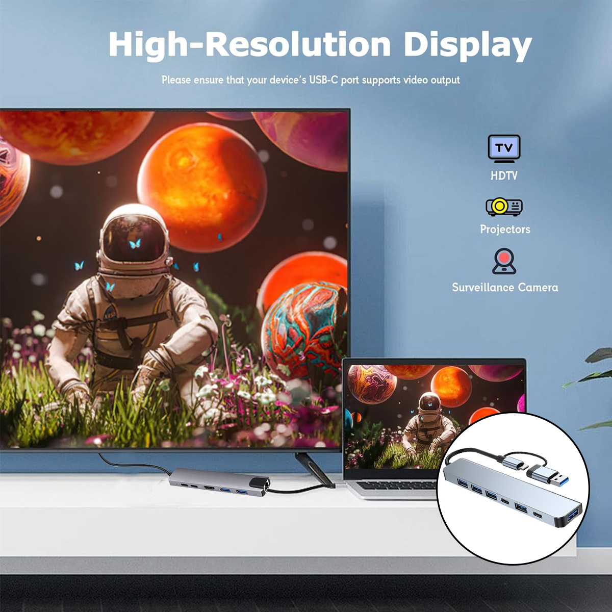 Ein Astronaut sitzt auf Gras, dargestellt auf einem Fernseher. Ein Laptop und ein USB-Hub sind verbunden. Logos für TV, Projektoren und Kamera.
