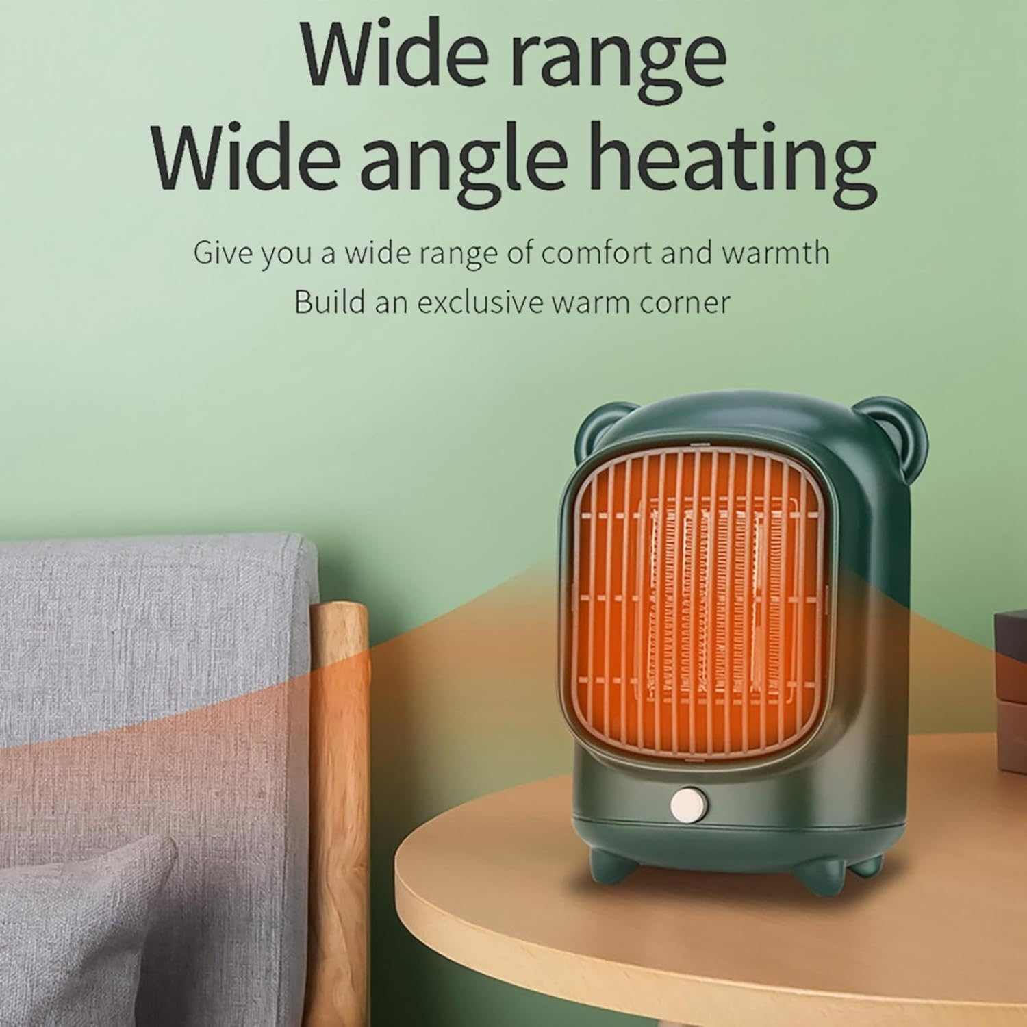 Ein grünes Heizgerät steht auf einem Tisch. Der Text lautet 'Wide range, Wide angle heating'. Links ist ein Sofa, der Hintergrund ist grün.