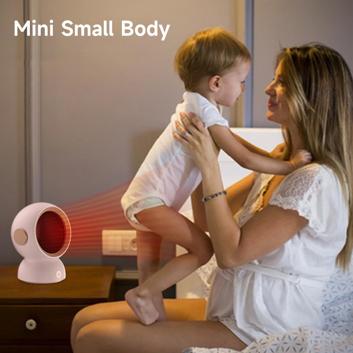 Eine Frau hält ein Baby in einem Raum. Ein kleiner rosa Heizlüfter befindet sich in der Nähe der Frau. Die Worte "Mini Small Body" stehen oben im Bild.