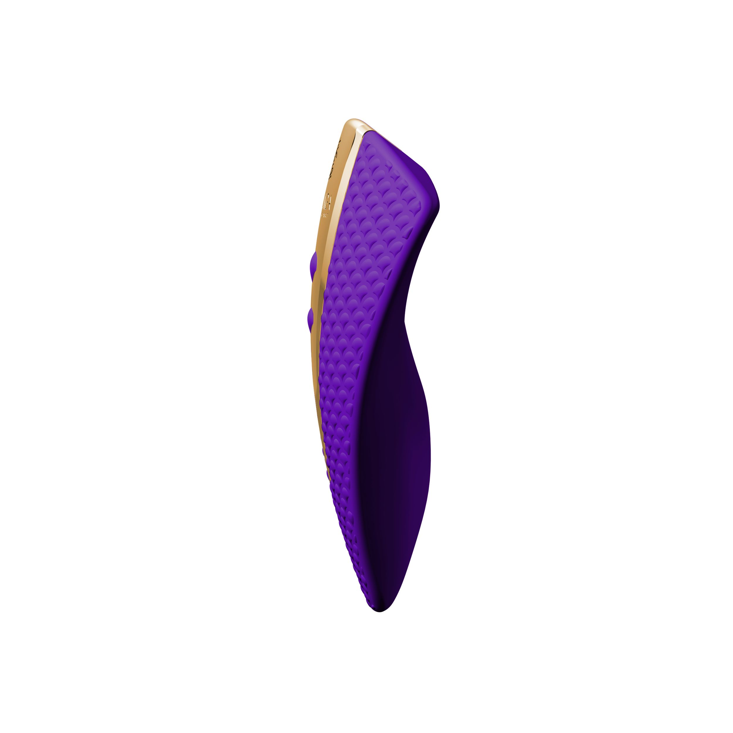 Juguete sexual morado y dorado sobre fondo blanco. El dispositivo tiene una superficie texturizada y está curvado.