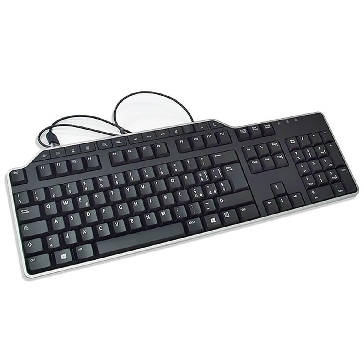 Tastiera di computer nera con lettere e numeri bianchi. Ha un bordo argentato ed è visibile un cavo di collegamento.