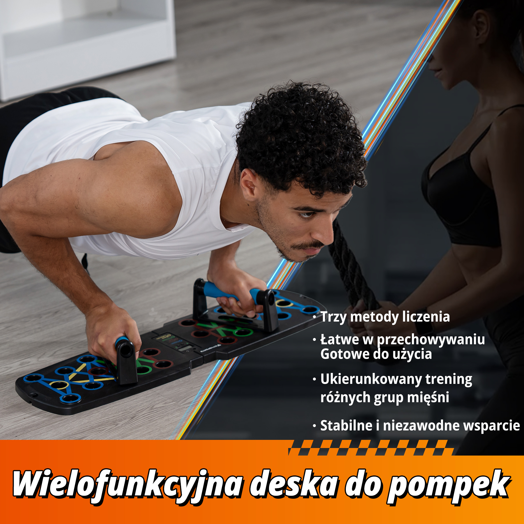 Mężczyzna robi pompki na wielofunkcyjnej desce. Kobieta w tle. Deska ma kolorowe uchwyty i różne punkty do ćwiczeń.