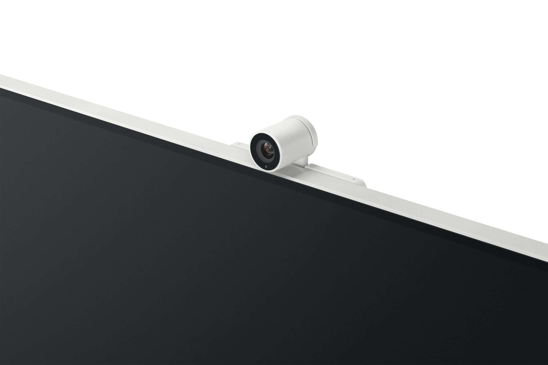 Una webcam bianca montata su un monitor bianco. Lo schermo è nero. Lo sfondo è bianco.