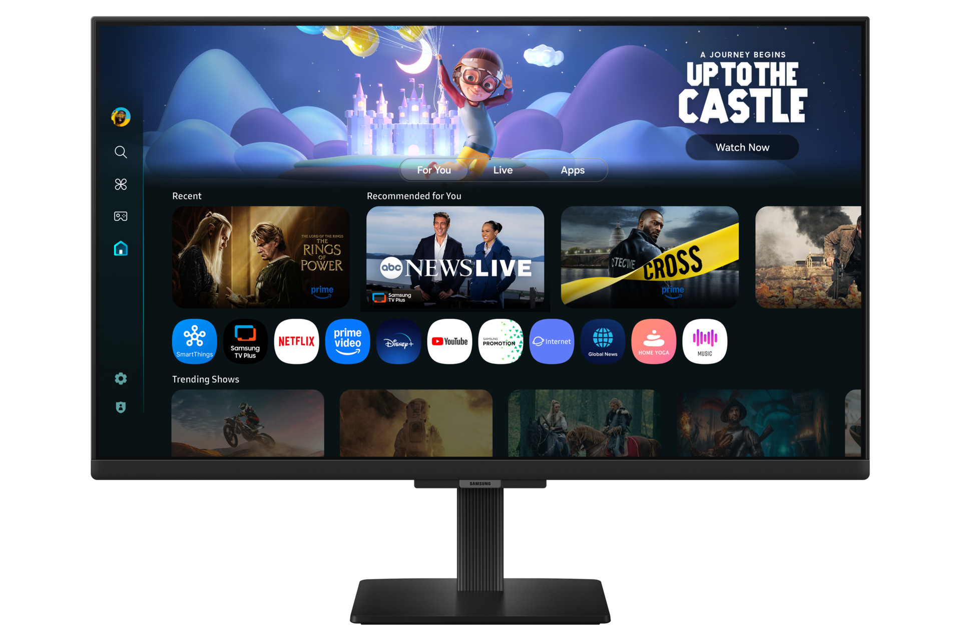 Uno schermo TV Samsung mostra un'interfaccia con app. Un personaggio dei cartoni animati vola verso un castello. Vengono mostrati programmi e app.