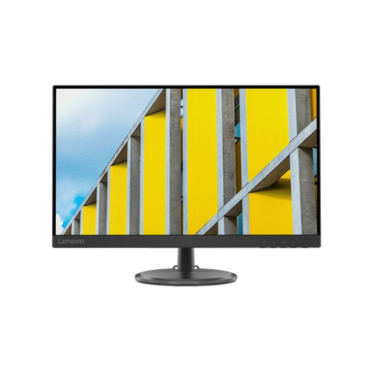 Un monitor Lenovo muestra un edificio moderno con paneles amarillos, vigas grises y cielo azul. El monitor tiene un marco y soporte negros.
