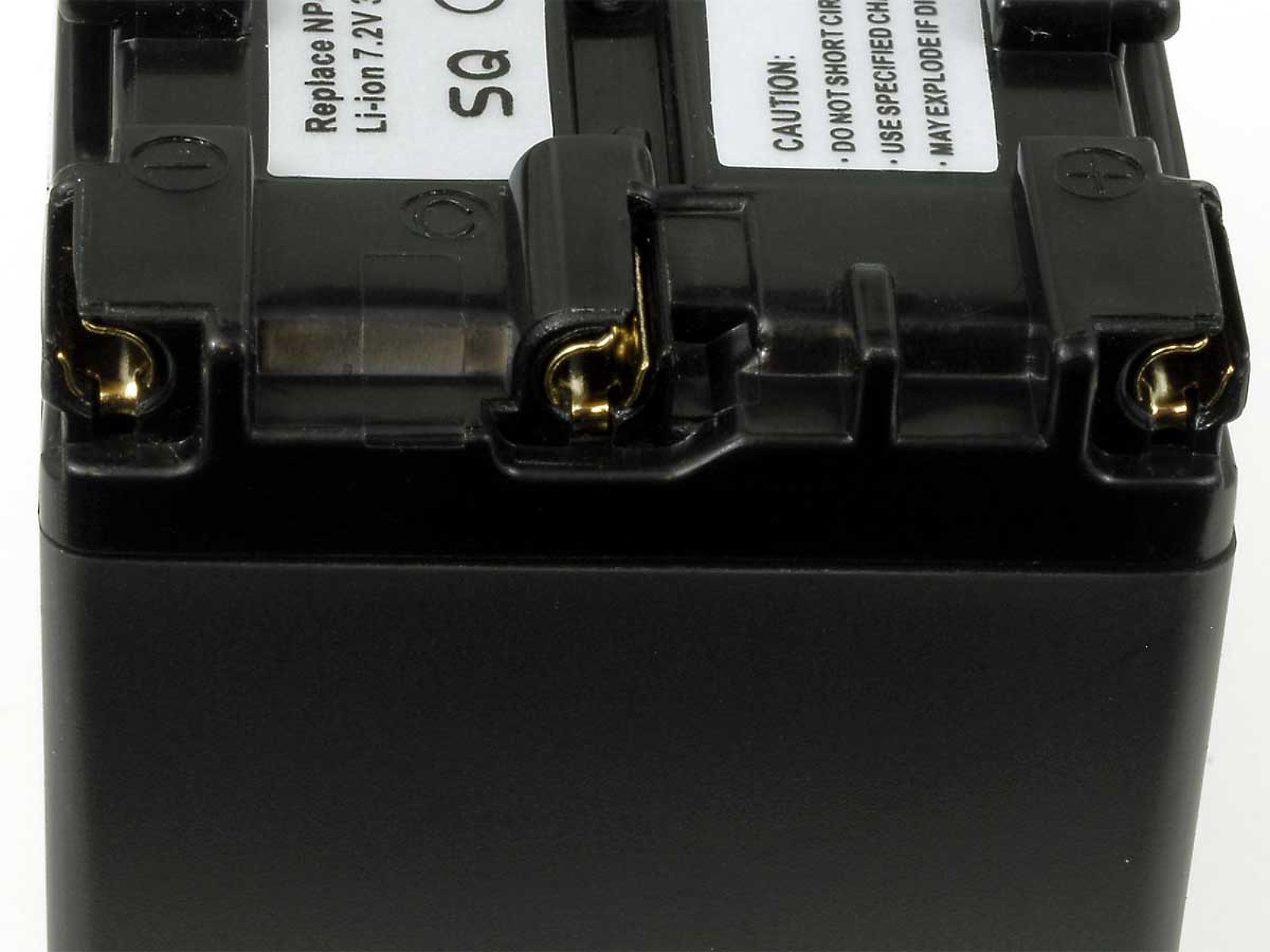 Una batería negra con contactos dorados, una etiqueta blanca con texto y una etiqueta de precaución son visibles. La batería es para un dispositivo Li-ion 7.2V.