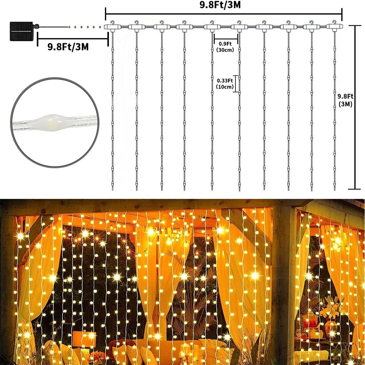 Eine Lichterkette mit warmweißen LEDs, mit Maßangaben. Die Lichter sind vor einer Struktur aufgehängt.