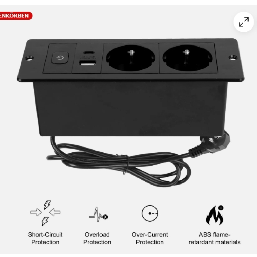 Schwarze Steckdose mit zwei Steckdosen, USB und Power-Taste. Darunter Symbole für Kurzschluss-, Überlast-, Überstrom- und Brandschutz.