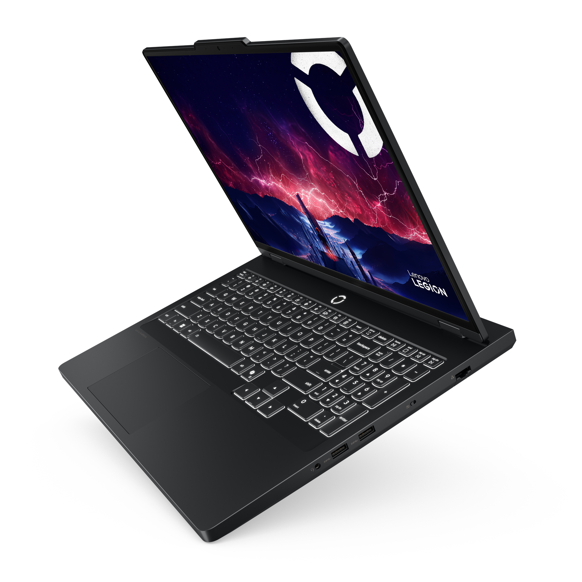Portátil Lenovo Legion negro en ángulo. Pantalla muestra logo sobre fondo morado y rojo. Teclado iluminado.