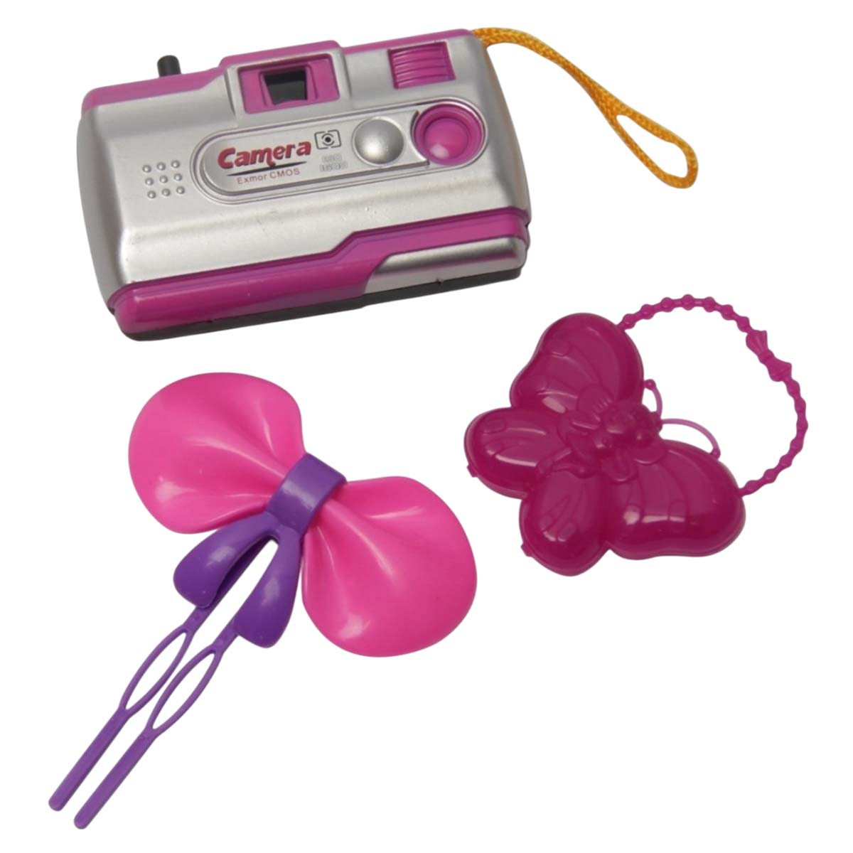 Eine Spielzeugkamera, eine rosa Schleifen-Haarspange und ein rosa Schmetterlings-Haargummi liegen auf weißem Hintergrund.