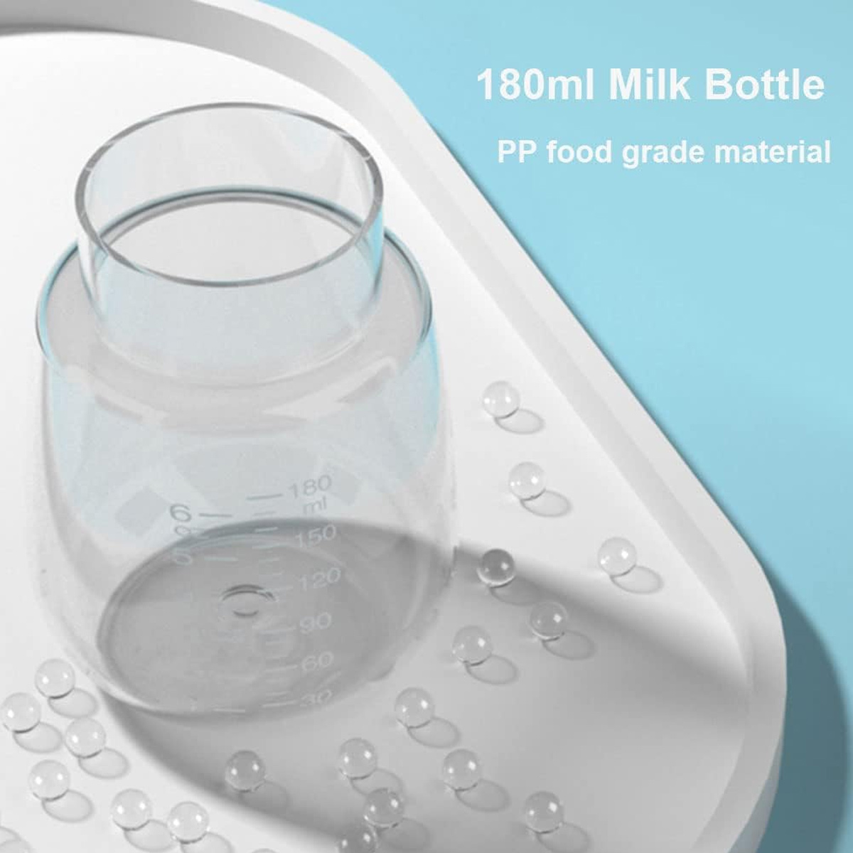 Eine klare Babyflasche mit Messungen steht auf einem weißen Tablett. Kleine, klare Kugeln sind um das Tablett verstreut, Text lautet 180ml Milk Bottle.