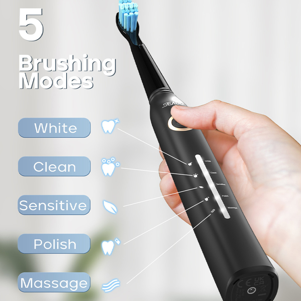 Eine Hand hält eine schwarze elektrische Zahnbürste mit blauen Borsten. Sie zeigt 5 Putzmodi an: Weiß, Sauber, Sensitiv, Polieren, Massage.