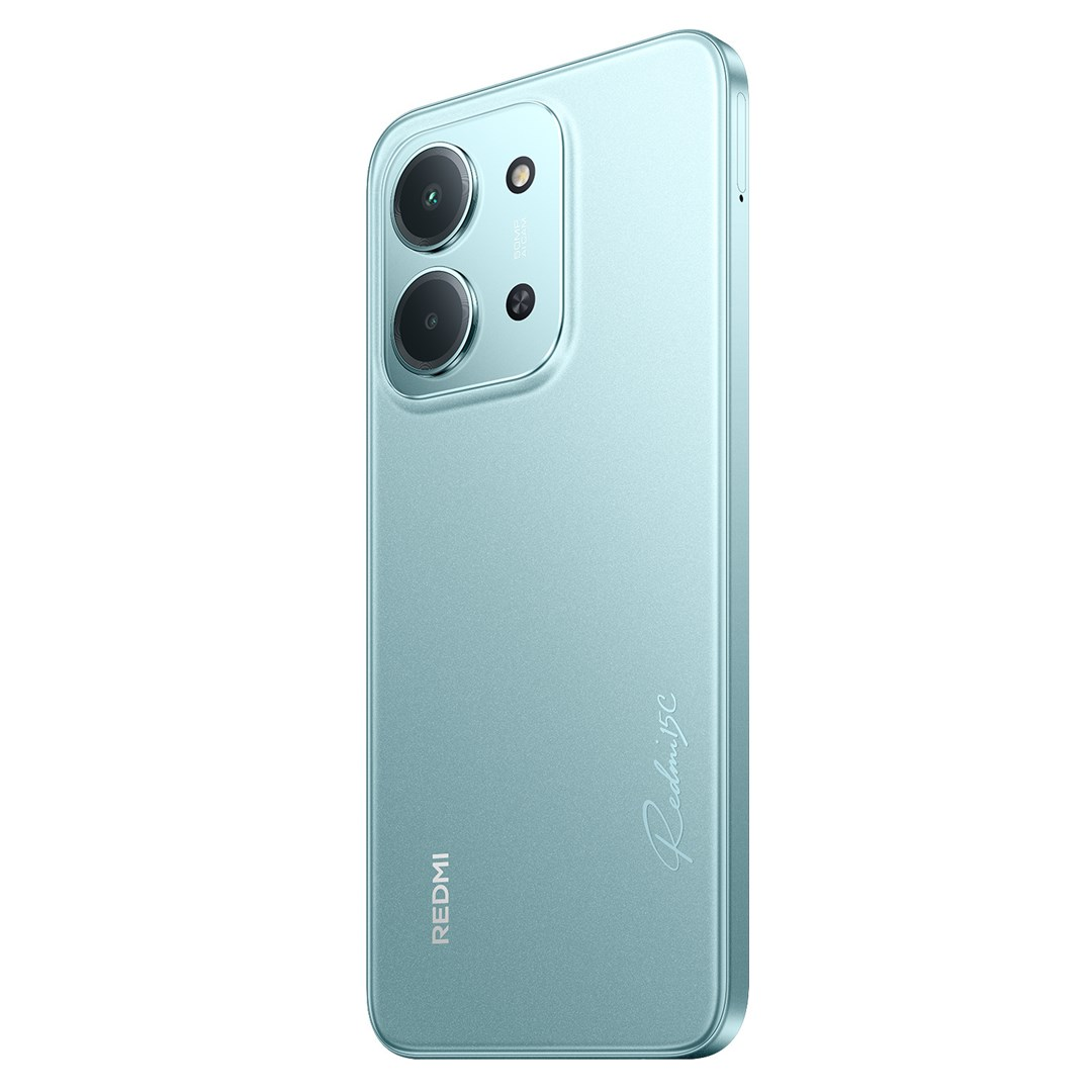 Een lichtblauwe Redmi 5C smartphone. Het heeft een dubbele camera-opstelling en een Redmi-logo. De telefoon staat schuin en toont zijn zijkant.