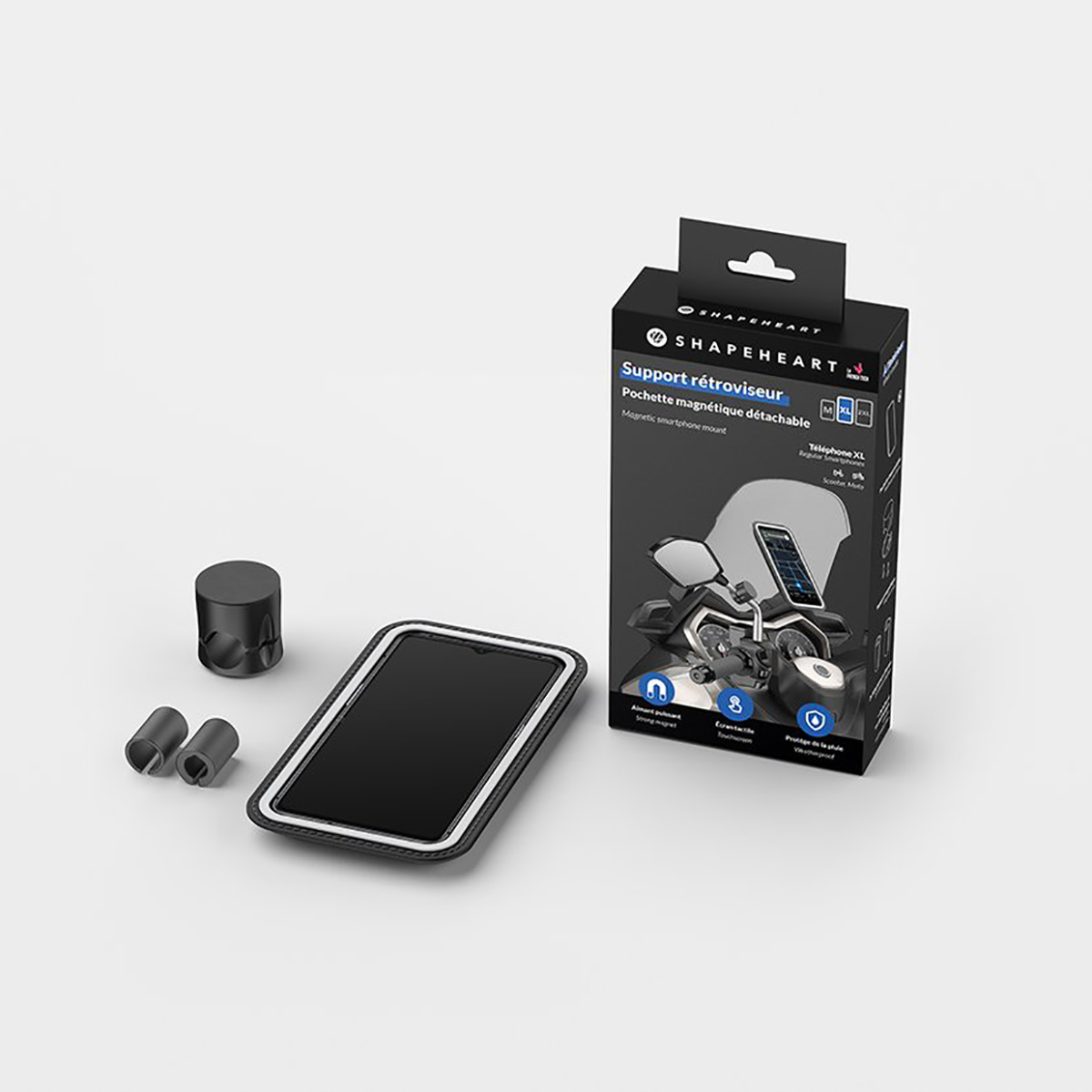 Un kit di montaggio per smartphone con telefono, scatola e accessori. La scatola dice SHAPEHEART. Il telefono è nero con un bordo bianco.